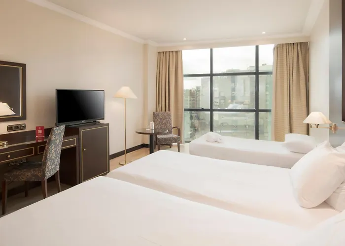 Exe Centro 4* Ов'єдо