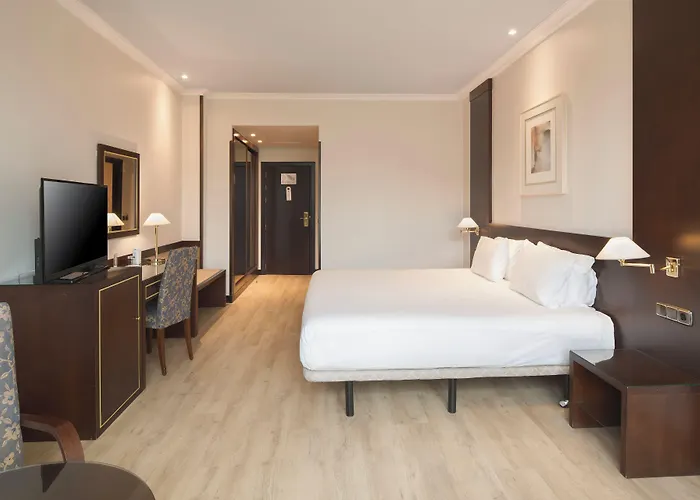 Exe Centro 4* Ов'єдо